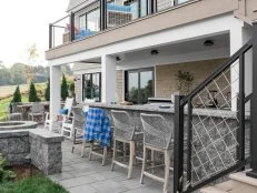 Outdoor Bar With Gray Stools