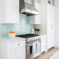 White Transitional Kitchen With Blue Backsplash