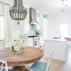 White Cottage Eat In Kitchen WIth Silver Chandelier