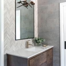 Gray Single Vanity Bathroom With Herringbone Pattern