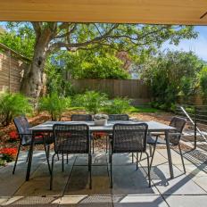 Outdoor Dining Area With Cane Chairs