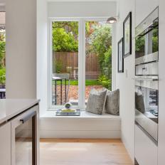 Kitchen Window Seat With Gray Pillows