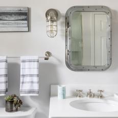 Transitional Bathroom With Metal Mirror
