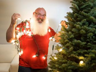 Host Albie Mushaney decorates at Sara's new house, as seen on You'll Be Home for Christmas.