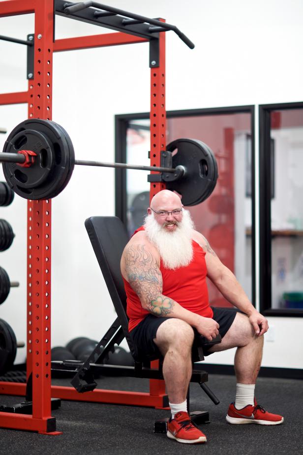 Host Albie Mushaney works out at the gym as seen on You'll Be Home for Christmas.