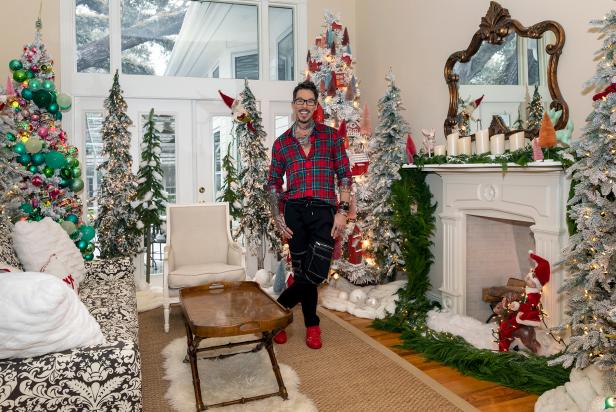 David Bromstad posing in the finished livingroom. My Lottery Dream Home; Holiday 2020