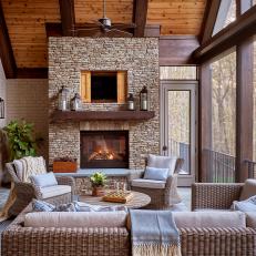 Rustic Screened Porch With Fireplace