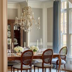 Traditional Dining Room With Blue Curtains