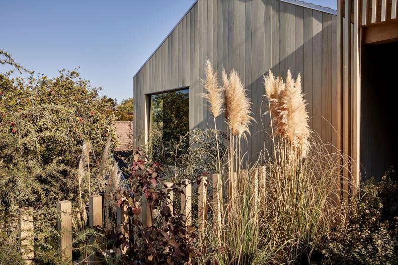 This modern home features Accoya wood and native plants.