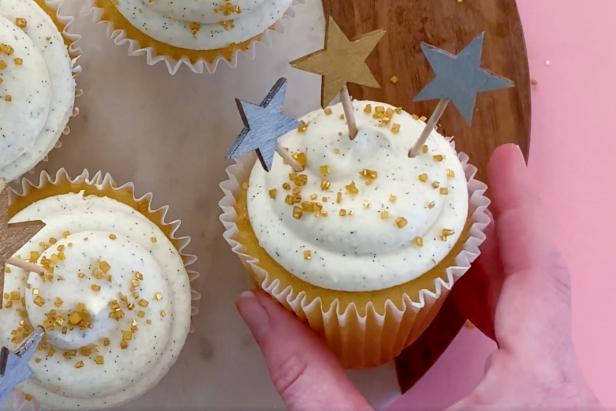 Tray of Cupcakes With Metallic Gold and Silver Wooden Star Toppers 