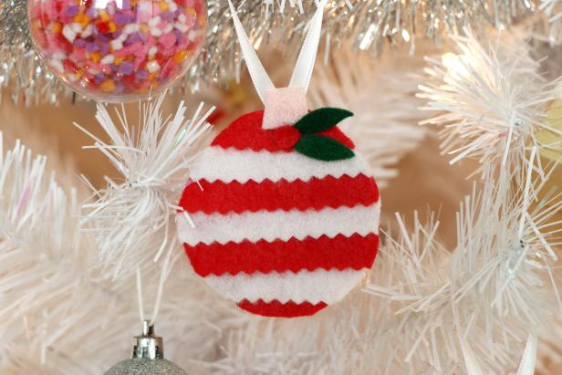 Red and White Felt Ornament on White Christmas Tree 