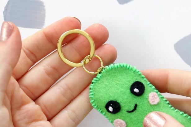 Add a key ring to the jump ring we sewed on to finish your cute avocado keychain.