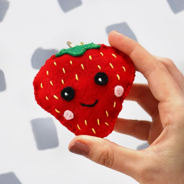 Create a strawberry plushie key chain the same way as the avocado.
