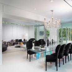 White Modern Dining Room With Black Chairs