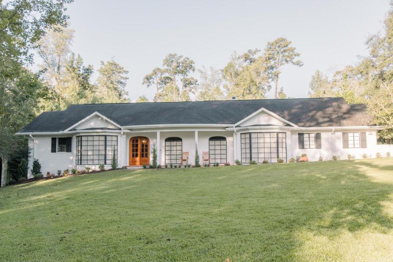 As seen on Home Town, the Combe residence has been fully renovated by Ben and Erin Napier. After renvations, their Laurel, MS home now features updated front doors, landscape, and columns. (After matches Before #2)