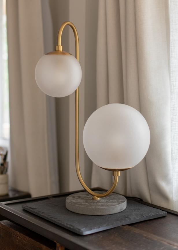 A modern globe tabletop lamp.
