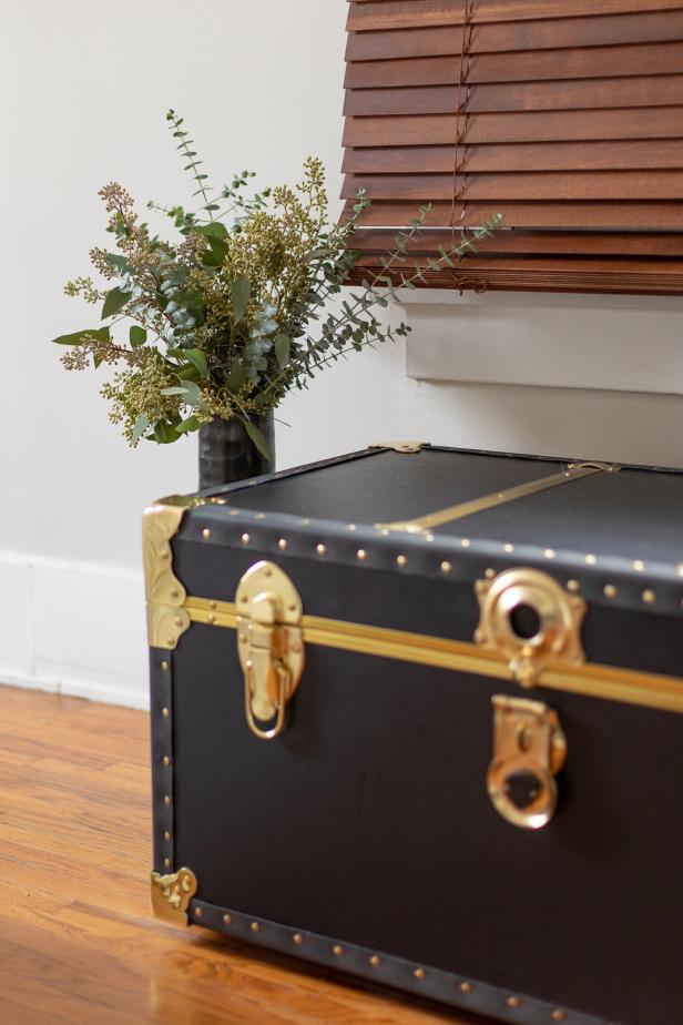 A sturdy travel trunk doubles as a table in this Los Angeles living room.