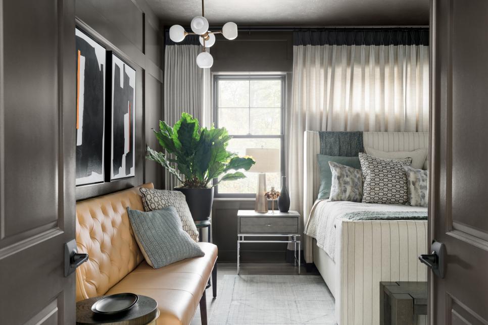 View Through Double Doors of Luxe Dark-Gray Master Bedroom