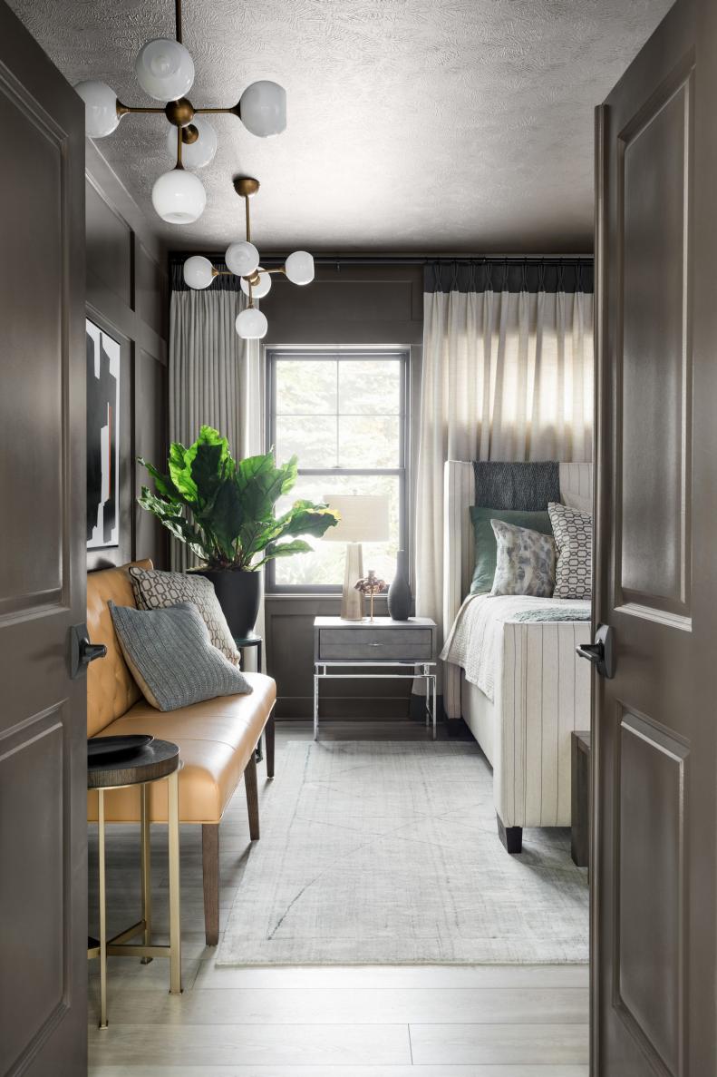 View Looking Into Luxurious Charcoal-Gray Master Bedroom