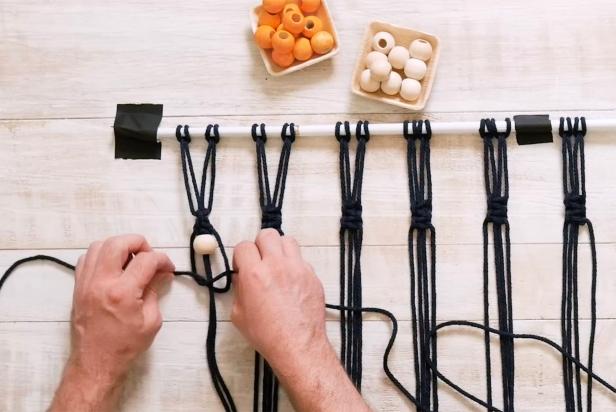 Add the first neutral bead to the row and tie a square knot. Use the step-by-step guide to create a square knot.