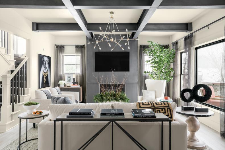 Neutral Transitional Great Room With Faux-Steel Exposed Ceiling Beams