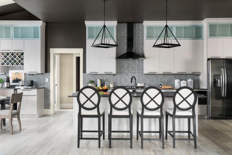 White Kitchen Cabinets Pop Against Charcoal-Gray Walls and Ceiling