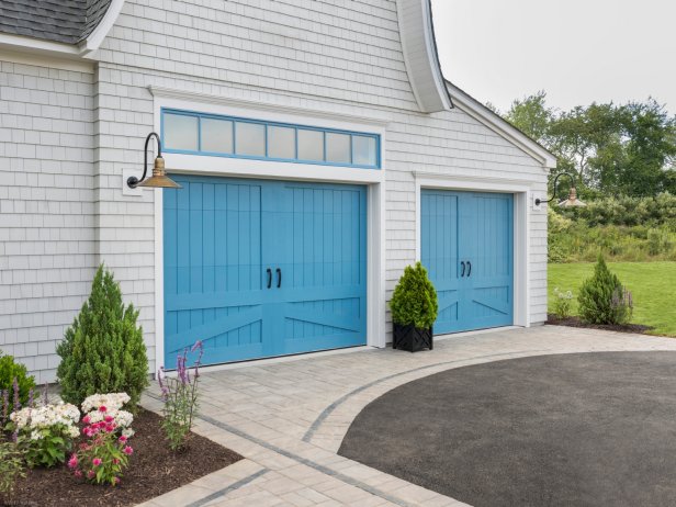 This garage door may look and feel like real wood, but it's made of moisture resistant materials so it won’t rot, warp, or crack. And, like real wood, the doors can be painted or stained.
 
The cladding and overlays are molded from the species they emulate for realistic grain texture.
 
The doors come in carriage house, modern, and louver designs.