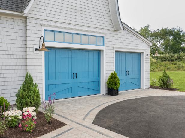 This garage door may look and feel like real wood, but it's made of moisture resistant materials so it won’t rot, warp, or crack. And, like real wood, the doors can be painted or stained.
 
The cladding and overlays are molded from the species they emulate for realistic grain texture.
 
The doors come in carriage house, modern, and louver designs.