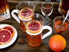 Swap out the lemon in your standard hot toddy with the sweet raspberry citrus flavor of seasonal blood orange for a delicious variation on the classic cocktail.