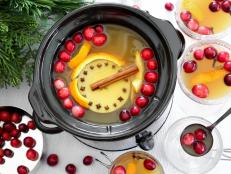 The flavor of this aromatic holiday drink deepens as the ingredients steep in your slow cooker. Place all the ingredients in the pot to warm as you make preparations for your party. When guests arrive, they can help themselves to a cup of Christmas cheer.