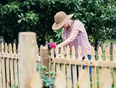 Add classic charm and curb appeal to your yard with a DIY fence that's easier to install than you might think.