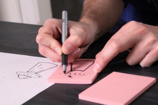 Once you've transferred the pencil design, outline the design on the rubber stamp with a permanent marker.