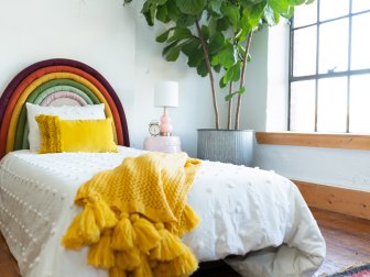 Twin Bed With Padded Rainbow Headboard