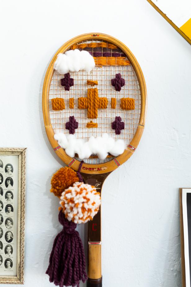 Editor Liz Gray used a vintage tennis racket as the base for this yarn wall art.