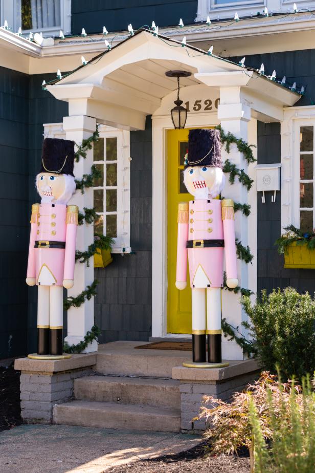 Front Porch Flanked by Giant DIY Nutcrackers