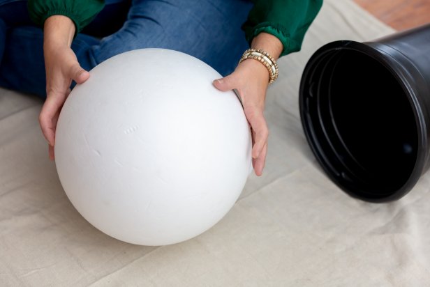 Large foam craft ball used for a large head on a DIY nutcracker Christmas decoration.