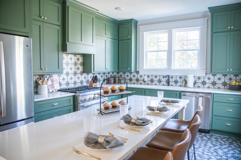 Ben and Erin have transformed the dark, dated kitchen at the Berry house into a cook’s paradise by adding new windows with a sink, an eat in island, stone counters, and tile backsplash