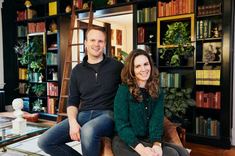 Kate Pearce and her husband, BIll, sit in their home library