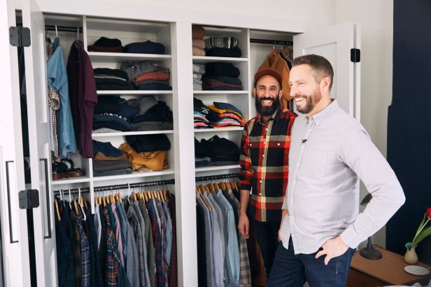 Two Men Laughing Beside Large Walk-In Closet in Home