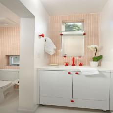 Pink and Red Bathroom With Orchid