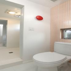 Pink Bathroom With Red Knob