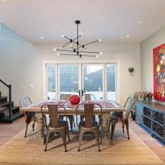 Dining Room With Red Art