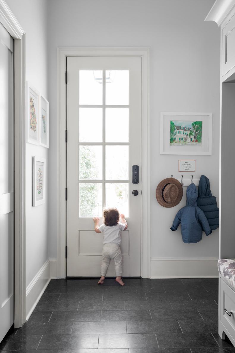 Keep your mud room feeling light and bright by adding a glass paned exterior door. This will allow natural light to filter in and keep the space mure cheerful during the daylight hours.