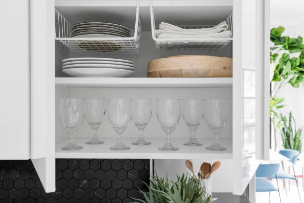 Stacking plates too high inside cabinets can result in a tumbling disaster. Put the dead space at the top of each interior cabinet to good use with plate shelving. These simply slide on to the shelf above each interior unit, turning empty space into valuable storage.