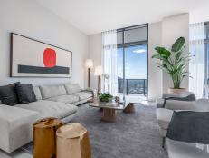 This modernized living room features an open view of Miami from the comfort of both the living room or out on the wrap around balcony.