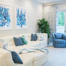 White and Blue Coastal Sitting Room With Brick Wall