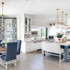 Blue and White Open Plan Kitchen and Dining Area