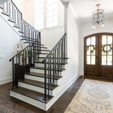 Traditional Foyer With White Runner