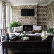 Cottage Sitting Room With Exposed Brick