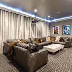 Beige Home Theater With Leather Sectional